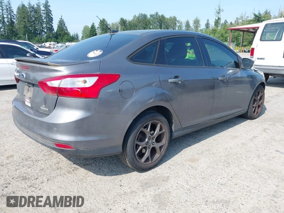 2013 Ford Focus SE with VIN 1FADP3F28DL233822, listed as a IAAI auction lot 42583041 with 135,728 mi miles and . Bid and sale history available at DreamBid. Image 4.