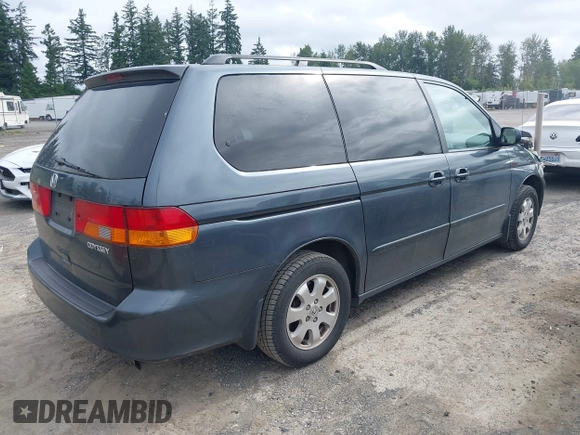2004 Honda Odyssey EX-L with VIN 5FNRL18064B066763, listed as a IAAI auction lot 42588622 with 499,993 mi miles and . Bid and sale history available at DreamBid. Image 4.
