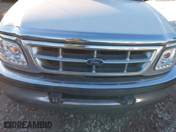 1998 Ford F-150 XL with VIN 1FTZX0724WKA18430, listed as a IAAI auction lot 41220499 with 129,780 mi miles and . Bid and sale history available at DreamBid. Image 6.