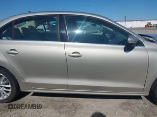 2013 Volkswagen Jetta TDI w/Premium/Nav with VIN 3VWLL7AJXDM233999, listed as a IAAI auction lot 42126691 with 151,658 mi miles and . Bid and sale history available at DreamBid. Image 14.