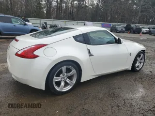 2012 Nissan 370Z z VIN JN1AZ4EHXCM562486, wystawiony jako Copart lot #44594005 z przebiegiem 79 150 mil mil oraz Szkoda całkowita • Salvage title. Historia ofert i sprzedaży dostępna na DreamBid. Obrazek 3.