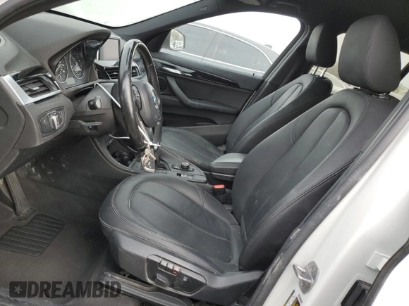 2018 BMW X1 sDrive28i with VIN WBXHU7C37J5H44386, listed as a Copart auction lot 42167135 with 96,668 mi miles and Salvage Title. Bid and sale history available at DreamBid. Image 7.