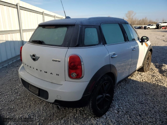 2013 MINI Cooper Countryman with VIN WMWZB3C5XDWR35519, listed as a Copart auction lot 82826894 with 89,832 mi miles and Salvage Title. Bid and sale history available at carsss.com. Image 3.
