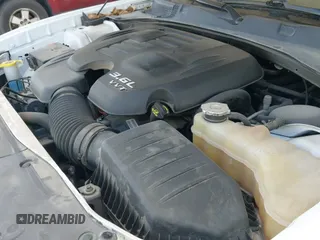 2021 Dodge Charger SXT with VIN 2C3CDXBG2MH522476, listed as a IAAI auction lot 43119164 with 85,384 mi miles and . Bid and sale history available at DreamBid. Image 19.