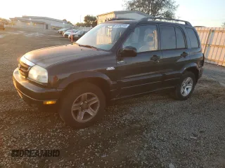 2001 Suzuki Grand Vitara z VIN JS3TE62V714151018, wystawiony jako Copart lot #81853144 z przebiegiem 102 915 mil mil oraz Czysty tytuł • Clean title. Historia ofert i sprzedaży dostępna na DreamBid. Obrazek 1.
