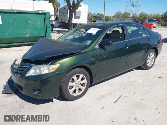 2011 Toyota Camry LE with VIN 4T4BF3EK2BR144228, listed as a IAAI auction lot 41754726 with 124,852 mi miles. Bid and sale history available at carsss.com. Image 2.