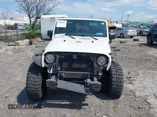 2012 Jeep Wrangler Unlimited Sport z VIN 1C4HJWDG0CL222194, wystawiony jako IAAI lot #42076024 z przebiegiem Nie podano mil oraz . Historia ofert i sprzedaży dostępna na DreamBid. Obrazek 13.
