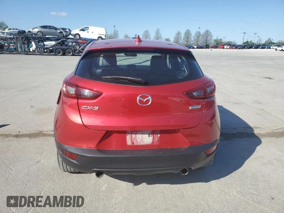 2017 Mazda CX-3 Touring z VIN JM1DKDC75H0170331, wystawiony jako Copart lot #51997455 z przebiegiem 141 405 mil mil oraz Szkoda całkowita • Salvage title. Historia ofert i sprzedaży dostępna na DreamBid. Obrazek 6.