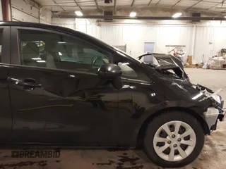 2014 Kia Rio LX with VIN KNADM4A32E6409785, listed as a IAAI auction lot 41810262 with 183,669 mi miles. Bid and sale history available at carsss.com. Image 19.