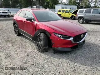 2024 Mazda CX-30 S Select Sport z VIN 3MVDMBBM9RM672178, wystawiony jako Copart lot #55751065 z przebiegiem 6 121 mil mil oraz Szkoda całkowita • Salvage title. Historia ofert i sprzedaży dostępna na DreamBid. Obrazek 13.