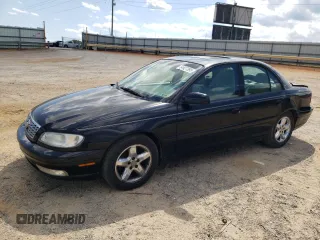 2000 Cadillac Catera z VIN W06VR54R0YR011736, wystawiony jako Copart lot #54927395 z przebiegiem 45 892 mil mil oraz Szkoda całkowita • Salvage title. Historia ofert i sprzedaży dostępna na DreamBid. Obrazek 1.