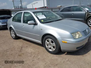 2004 Volkswagen Jetta GLS z VIN 3VWSK69M94M091877, wystawiony jako IAAI lot #42444900 z przebiegiem 126 724 mil mil oraz . Historia ofert i sprzedaży dostępna na DreamBid. Obrazek 1.