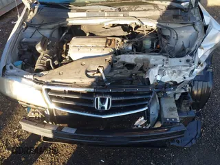 2002 Honda Odyssey EX z VIN 2HKRL18652H566576, wystawiony jako IAAI lot #40974704 z przebiegiem 232 172 mil mil oraz . Historia ofert i sprzedaży dostępna na DreamBid. Obrazek 10.