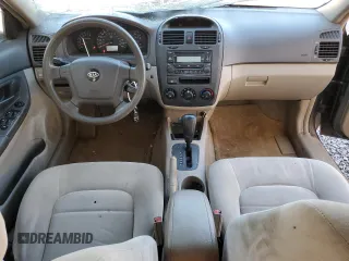 2006 Kia Spectra EX with VIN KNAFE122665277678, listed as a Copart auction lot 74695984 with 205,742 mi miles and Salvage Title. Bid and sale history available at carsss.com. Image 8.