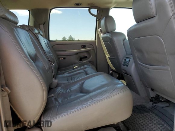 2004 Chevrolet Suburban LT with VIN 3GNFK16T24G168520, listed as a Copart auction lot 64969795 with 215,145 mi miles and Salvage title. Bid and sale history available at DreamBid. Image 11.