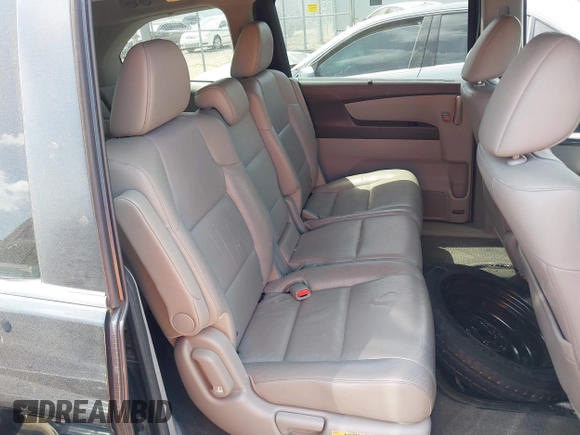 2011 Honda Odyssey EX-L with VIN 5FNRL5H62BB063125, listed as a IAAI auction lot 42562541 with 140,787 mi miles and . Bid and sale history available at DreamBid. Image 8.