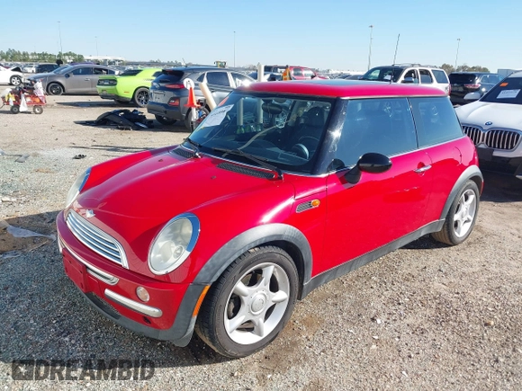2003 MINI Hardtop with VIN WMWRC33413TC48601, listed as a IAAI auction lot 41418901 with 57,095 mi miles and . Bid and sale history available at DreamBid. Image 2.