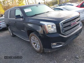 2016 GMC Yukon XL SLE with VIN 1GKS1FKC6GR140418, listed as a IAAI auction lot 41843064 with 155,472 mi miles. Bid and sale history available at carsss.com. Image 1.