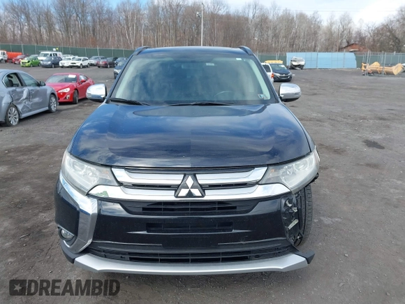 2016 Mitsubishi Outlander SE with VIN JA4AD3A39GZ003885, listed as a IAAI auction lot 41869646 with 193,320 mi miles and . Bid and sale history available at DreamBid. Image 12.