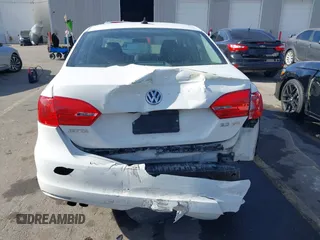2012 Volkswagen Jetta Sedan SE w/Convenience with VIN 3VWDX7AJ7CM377081, listed as a IAAI auction lot 40756653 with 120,019 mi miles. Bid and sale history available at carsss.com. Image 17.
