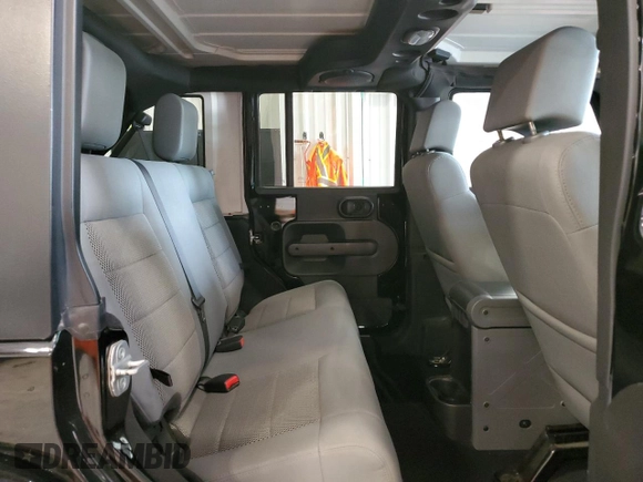 2008 Jeep Wrangler Unlimited Sahara with VIN 1J4GA59108L637009, listed as a Copart auction lot 63333705 with 181,778 mi miles and Clean title. Bid and sale history available at DreamBid. Image 11.