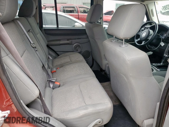 2007 Jeep Commander Sport z VIN 1J8HG48K27C697717, wystawiony jako Copart lot #53550395 z przebiegiem 288 452 mil mil oraz Szkoda całkowita • Salvage title. Historia ofert i sprzedaży dostępna na DreamBid. Obrazek 11.