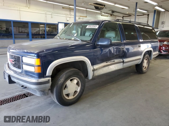 1999 GMC Suburban z VIN 3GKFK16R5XG525338, wystawiony jako Copart lot #58920565 z przebiegiem 212 586 mil mil oraz Szkody całkowita. Historia ofert i sprzedaży dostępna na DreamBid. Obrazek 1.