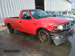 2001 Ford F-150 XL z VIN 3FTZF17291MA72686, wystawiony jako Copart lot #83103904 z przebiegiem 126 018 mil mil oraz Szkoda całkowita • Salvage title. Historia ofert i sprzedaży dostępna na DreamBid. Obrazek 4.