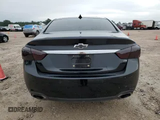 2014 Chevrolet Impala LTZ with VIN 1G1155S38EU145807, listed as a Copart auction lot 53116564 with 134,580 mi miles and Salvage Title. Bid and sale history available at DreamBid. Image 6.