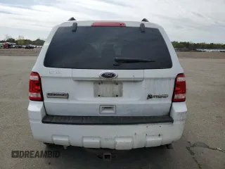 2010 Ford Escape Hybrid z VIN 1FMCU5K35AKC13081, wystawiony jako Copart lot #55447445 z przebiegiem 74 496 mil mil oraz Czysty tytuł • Clean title. Historia ofert i sprzedaży dostępna na DreamBid. Obrazek 6.