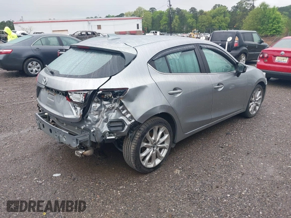 2014 Mazda 3 S Touring with VIN JM1BM1L30E1187539, listed as a IAAI auction lot 41974709 with 111,189 mi miles and . Bid and sale history available at DreamBid. Image 4.
