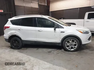 2016 Ford Escape Titanium with VIN 1FMCU9J94GUB02810, listed as a IAAI auction lot 41643907 with 119,684 mi miles. Bid and sale history available at carsss.com. Image 12.
