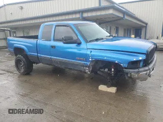 2001 Dodge 2500 with VIN 1B7KF23711J573917, listed as a Copart auction lot 51144335 with 257,686 mi miles and Salvage Title. Bid and sale history available at carsss.com. Image 4.