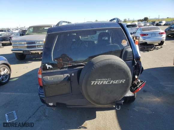 2003 Chevrolet Tracker LT with VIN 2CNBJ634936906291, listed as a Copart auction lot 89198025 with NaN miles and Salvage Title. Bid and sale history available at carsss.com. Image 6.
