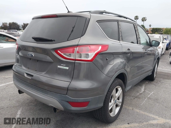 2013 Ford Escape SE with VIN 1FMCU0GX7DUA86521, listed as a IAAI auction lot 42041532 with 108,776 mi miles and . Bid and sale history available at DreamBid. Image 4.