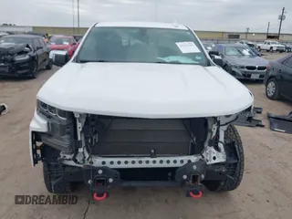 2021 Chevrolet Silverado 1500 LTZ with VIN 3GCUYGED3MG141869, listed as a IAAI auction lot 41233782 with 59,753 mi miles and . Bid and sale history available at DreamBid. Image 12.