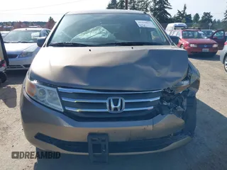 2013 Honda Odyssey LX z VIN 5FNRL5H29DB055166, wystawiony jako IAAI lot #41965037 z przebiegiem 122 470 mil mil oraz . Historia ofert i sprzedaży dostępna na DreamBid. Obrazek 12.