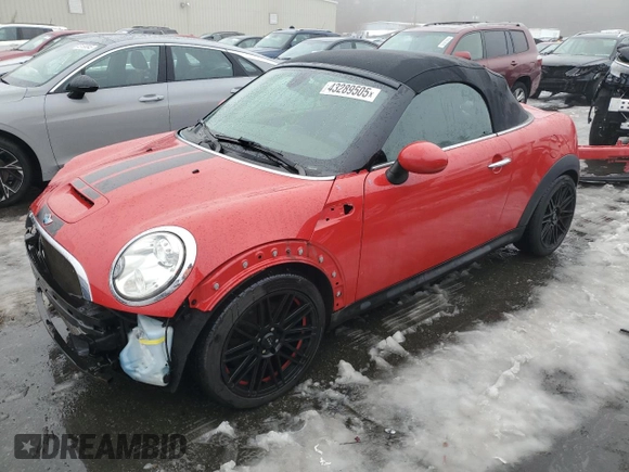 2015 MINI Roadster S z VIN WMWSY3C58FT567023, wystawiony jako Copart lot #43289505 z przebiegiem 115 029 mil mil oraz Szkoda całkowita • Salvage title. Historia ofert i sprzedaży dostępna na DreamBid. Obrazek 1.