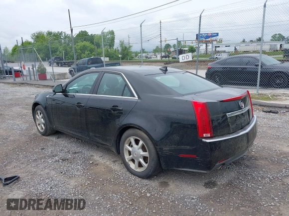 2009 Cadillac CTS RWD with VIN 1G6DF577190137609, listed as a IAAI auction lot 42196209 with 111,843 mi miles and . Bid and sale history available at DreamBid. Image 3.