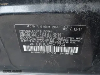 2012 Subaru Impreza Sedan 2.0i Premium with VIN JF1GJAC6XCH013674, listed as a IAAI auction lot 41081921 with 104,703 mi miles. Bid and sale history available at carsss.com. Image 9.