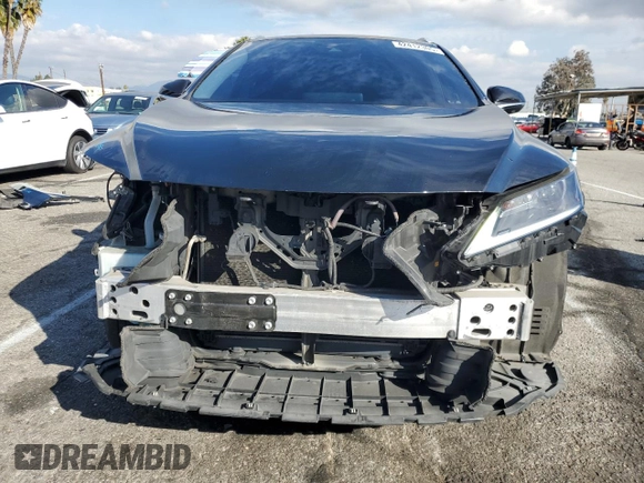 2021 Lexus RX with VIN 2T2HZMAA4MC206615, listed as a Copart auction lot 42412305 with 130,480 mi miles and Salvage Title. Bid and sale history available at carsss.com. Image 5.