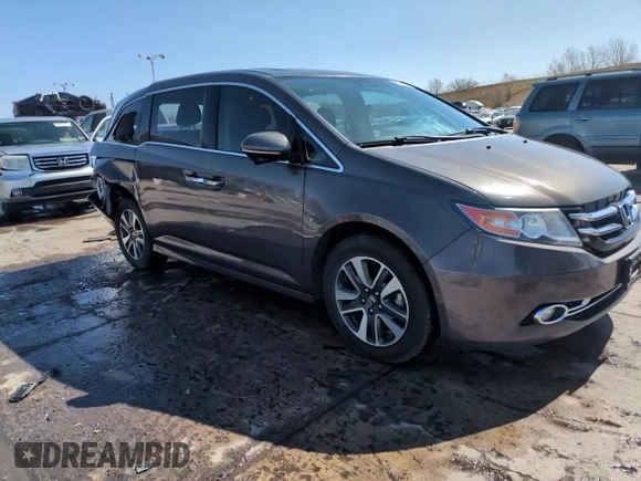 2014 Honda Odyssey Touring with VIN 5FNRL5H95EB052523, listed as a Copart auction lot 52214055 with 131,350 mi miles and Salvage Title. Bid and sale history available at DreamBid. Image 14.