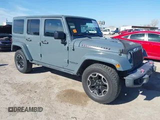 2015 Jeep Wrangler Unlimited Rubicon with VIN 1C4BJWFG7FL525724, listed as a IAAI auction lot 41394059 with 132,058 mi miles. Bid and sale history available at carsss.com. Image 1.