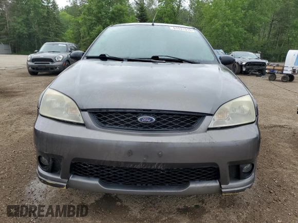 2007 Ford Focus S with VIN 1FAFP31N37W317625, listed as a Copart auction lot 61531315 with 230,530 mi miles and Clean title. Bid and sale history available at DreamBid. Image 5.