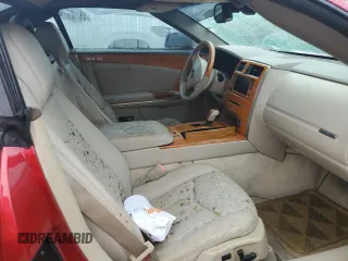 2005 Cadillac XLR z VIN 1G6YV34AX55600837, wystawiony jako Copart lot #75055604 z przebiegiem Nie podano mil oraz Szkody całkowita. Historia ofert i sprzedaży dostępna na DreamBid. Obrazek 10.