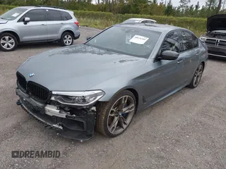 2019 BMW 5 Series M550i xDrive with VIN WBAJB9C57KB289439, listed as a IAAI auction lot 40634389 with 85,992 mi miles and . Bid and sale history available at DreamBid. Image 18.