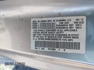 2012 Honda Odyssey Touring with VIN 5FNRL5H90CB099519, listed as a IAAI auction lot 41854550 with 185,110 mi miles. Bid and sale history available at carsss.com. Image 9.