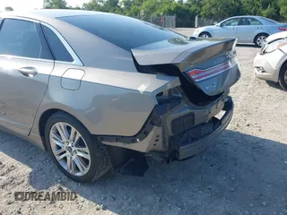 2016 Lincoln MKZ z VIN 3LN6L2G96GR601677, wystawiony jako IAAI lot #42647759 z przebiegiem 87 283 mil mil oraz . Historia ofert i sprzedaży dostępna na DreamBid. Obrazek 14.