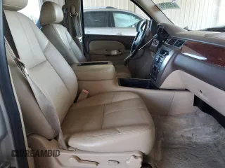 2014 GMC Yukon XL SLT with VIN 1GKS1KE09ER188163, listed as a Copart auction lot 43008295 with 99,479 mi miles and Salvage Title. Bid and sale history available at carsss.com. Image 7.