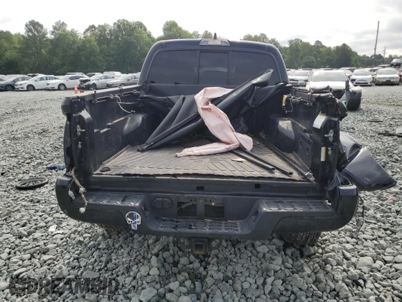 2020 Toyota Tacoma SR5 with VIN 3TMCZ5AN0LM299243, listed as a Copart auction lot 58818825 with 76,449 mi miles and Salvage title. Bid and sale history available at DreamBid. Image 6.